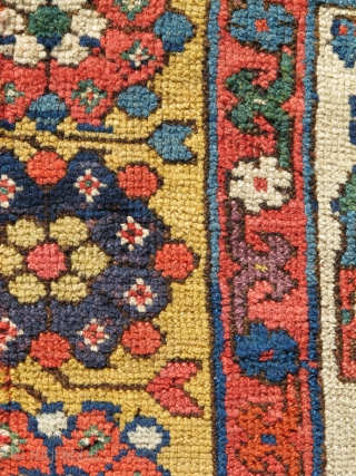 Transplendently Colorful Early Northwest Persian Kurdish Fragment. Saturated and radiant yellows, green, purples, blues on an ivory ground. Fantastic wool and handle. Old! How old you ask? Old enough. Not Devonian old  ...