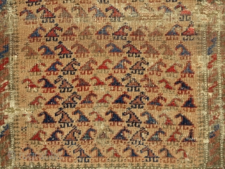 Small camel-ground Baluch rug with zoomorphic looking botehs. Very cute piece with some damage but complete. size= 26"x37"               