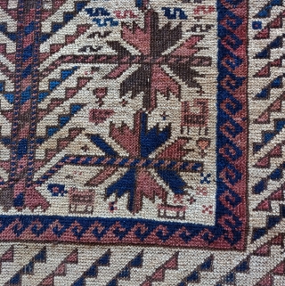 Small Baluch prayer rug. Several features more typically associated with 'Timuri' varriants but with a camel instead of a blue ground. Nice flatwoven email. Some staining in the top right field. Nice  ...