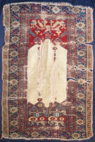Ladik Prayer Rug with Double-Columns as well as Double Spandrels. Rare and beautiful white ground and exceptional aubergine and red spandrels. circa 1770, mounted and conserved. a fantastic example. size= 3'7"x 5'7"
 