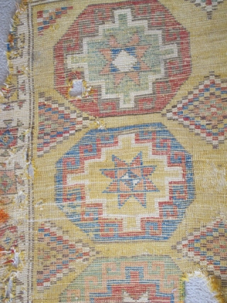 Konya Memling Gul Rug, fragmented at top. Memling guls measure about 13" square with some variations. Fantastic vibrant color including aubergine, apricot and modeled greens. Very probably 18th century, size is apx.  ...