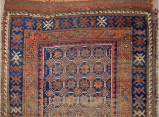 Baluch Runner, great natural colors, woven like a giant long bagface with a repeat mosaic like pattern of eight-pointed stars in a lattice. "Arab" type, open right, with corroded deep indigo almost  ...