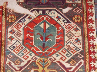 Lenkoran design Kazak? fragment. Top notch color including a perfect grape purple. The blue-grey ground is rare and a great backdrop for such boldly drawn and colored ornament. Dynamic drawing with Memling  ...