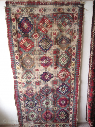 Moghan with Memling Guls, First Half 19th century, great color including at least two reds, three blues, purple, etc. cotton in the wefting. Obvious condition issues, uncommon beauty and power despite.  