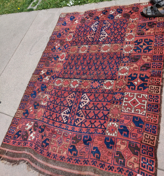 Middle Amu Darya region Turkmen or Uzbek ensi. Older than most of this type. Large scale with bold yet in abbreviated drawing. Great wool and in good condition. Macrame ends preserved at  ...