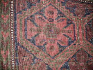 Antique Baluch Rug with rosettes in a lattice. All narural colors. 89x 152 cm(35''x60'' inches)
                  