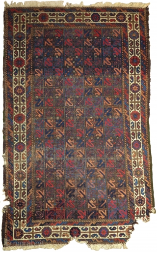 small symmetrically knotted Baluch rug. The field design is composed of a repeat made up from the tendrils of harshang blossoms (blossoms excluded) of the type more typically found in the borders  ...