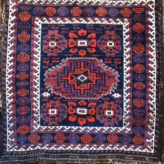 Complete Baluch khorjin with a very unusual design integrating minakhani flowers with a central Memling medallion. All good colors and in good condition. Probably Torbat-i Jam, circa 1880.  Very rare and  ...