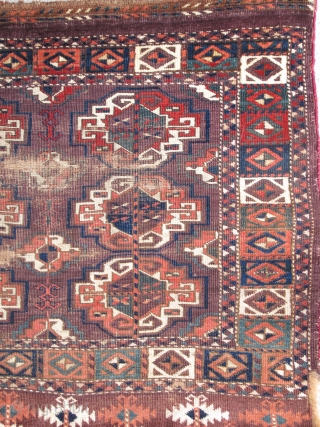 Chodor Chuval, large Turkmen bagface with large well-spaced chuval guls. Saturated madder-red abrash, greens, blue-greens, and slate blue.               