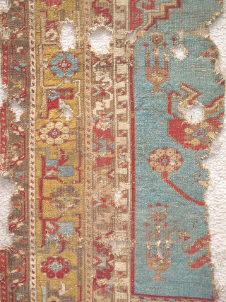 Ladik Prayer Rug, late 18th century, severely fragmented in two sections, dynamic drawing with many stylized ewers, very dirty and damaged but with a vibrant and uncommon gold border, recently found in  ...