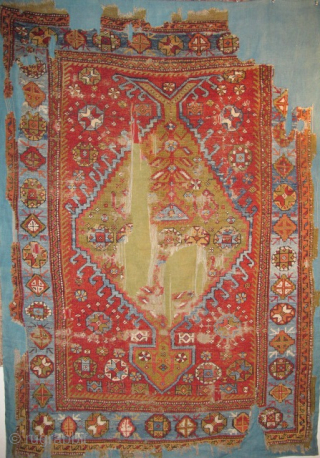 Western Anatolian Medallion Rug, great color and organic asymmetry, mounted and conserved.                     