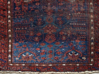 Baluch balisht from northeast Persia, fine weave and lots of different blues and greens, dynamic drawing of the tree and accompanying repertoire of ornament. The  bottom is thicker than the top  ...