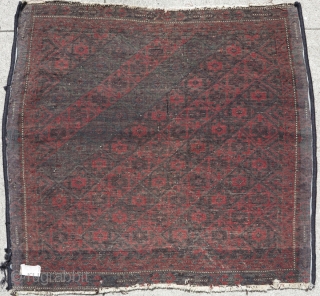 Large Sistan Baluch khorjin (bagface). Very graphic with saturated natural dyes including aubergine and several green-blue hues.
                