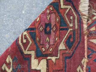 Very uncommon Kizyl Ayak Turkmen main carpet fragment featuring large chuval-style guls with substantive silk highlights. 17"x24"                