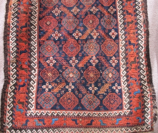 Arab? Baluch Rug . asymmetrical knot open right but with 4-chord goat selvedge. Running dog minor borders and other features of Khorossan minakhani Baluchis of the depressed warp type but without the  ...