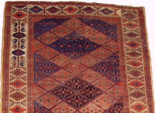 Baluch border-changing rug. Perhaps the weaver was just feeling playful? An elegant rug in very presentable condition. Well balanced drawing, subtle abrash with three blues. This rug was published in Basha's rather  ...