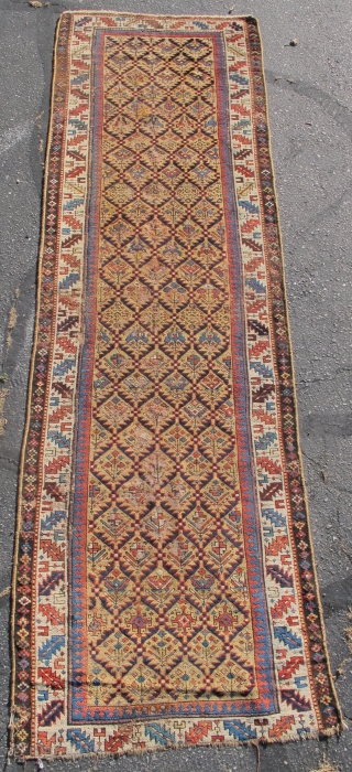 Shirvan runner with a gold ground, 3'4"x10'1"                          