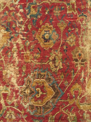 Isfahan Carpet, Safavid era, first half 17th century, silk and cotton warp, cotton weft, lac red ground, fine weave, cut and shut, scattered old repair and damage, still majestic. size= 4'8"x6'
 Note  ...