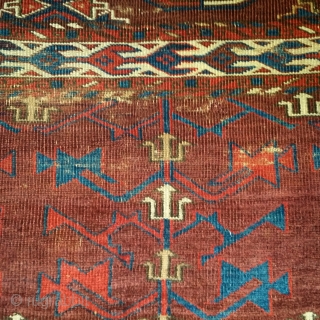 Turkmen Yomut Chuval, worn but much more interesting than most of the type. fine weave, precision detailing and great color saturation. Very interesting things happening within the negative space, especially within the  ...