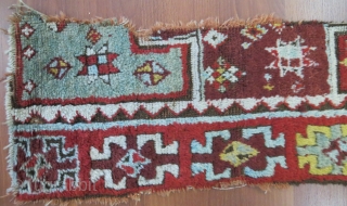 Fragment of a Yörük rug from the Karaman area, nice high pile, black corroded, around middle of 19th.               