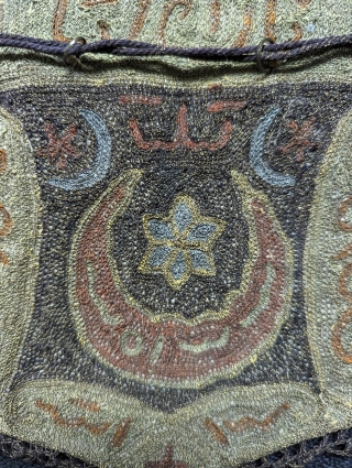 Anatolian embroidered coin bag,  7" x 5 1/2". c. 1900.  Wool with metal thread embroidery.                