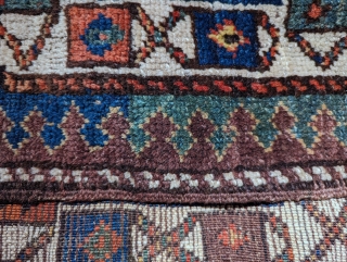 Persian bagface. Hard to place this one -- punt and say: Kurdish? Overall nice design with an unusual main border.  A smaller piece that reads well from a distance.  Very  ...