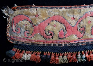 Central Asian, most likely Kirghiz, leather and felt.  Not sure what this is, but most likely an animal trapping, perhaps a decorated pad for saddle or harness.  The face is  ...