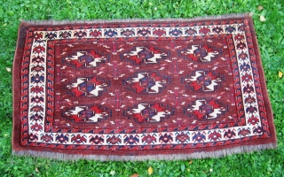 Early 19th century Turkmen Yomut chuval, most probably from Yomut Igdyr subgroup. Great natural colors, no tears, holes or stains. Circa 1825. Rare piece.
Measures : 24" x 45"  _______  61  ...