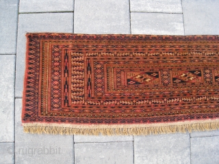  antique Tekke Torba in MINT condition. Asymmetrical knots open right, one level warps.(not depressed warps)

Size: 1.1 x 3.7 ft      32 x 112 cm    