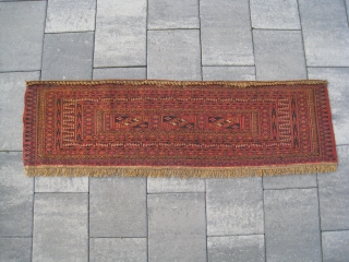  antique Tekke Torba in MINT condition. Asymmetrical knots open right, one level warps.(not depressed warps)

Size: 1.1 x 3.7 ft      32 x 112 cm    