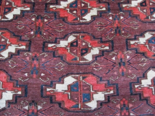 Fine 19th century Yomud group chuval ,or maybe Arabachi? in excellent condition, full pile, no damages and all natural colors. The piece shows in a violet-brown groundcolor nine magnificent orange-white chuval guls  ...