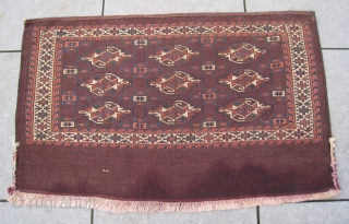 Excellent 19thC Yomud Yomut chuval. It shows a beautiful purple-brown central field. All natural colors, symmetrically knotting. Age: circa 1875. Clean. Lower edge excellent secured. No damages at all.
Size: 2'6" x 4'2"  ...