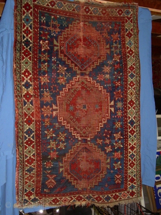 caucasian rug, 3' 6" x 5' 10" ... some nice color and drawing foundation mostly there.  one redorange looks whitish on back?  lots stars, one with legs.  $200 by  ...
