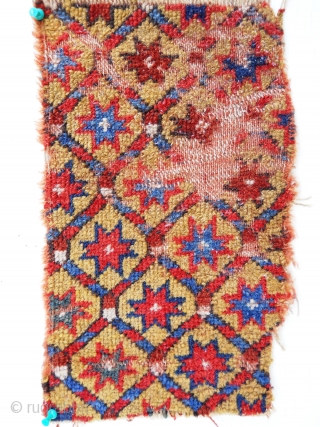 Fragment 9" x 14" with great color including mustard yellow field. Nice example of early weaving.                 