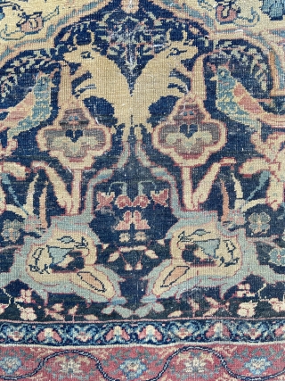 Early lavar Kirman - about 8.5 x 11.4 finely woven with mythical creatures, horned animals, birds, and fowl.  In as found condition with overall wear, scattered holes, etc.    