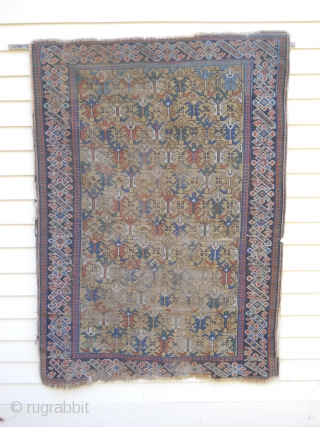 5.2 x 3.8 -  Beautiful Yellow ground with 'chi chi' border.  Areas of wear, old flat stitch repair,ends unravelling, needs cleaning.  Great Old caucasian rug.     