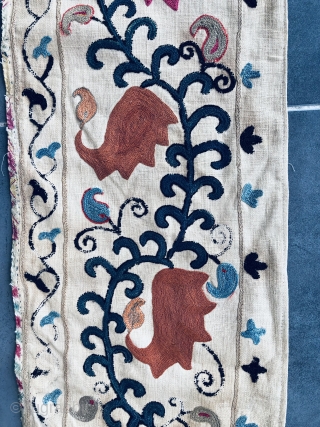 Beautiful early 19th century Uzbek mihrab Suzani. Excellent chain stitches and natural dye colours. The size is 80cm by 160cm. Reasonable price.           