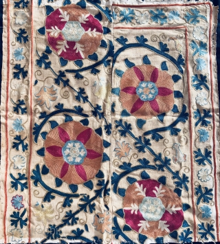 Beautiful 19th century Central Asian Uzbek Buckhara Region Suzani fragment. Excellent chain stitches and natural dye colours. Perfect condition. It is already mounted. The size is 60cm to 85cm. Offered reasonable price. 