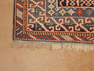 OLD OLD KUBA WITH GREEN BORDER COMPLET KNOTTED ENDS -SOME WEAR -ESTATE RUG 4 X 6 SIZE
ALL NATYRAL DYES - COMPLETE ORIGINAL SIDES AND ENDS - $1600

      