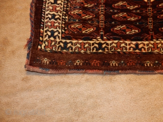 SMALL YOMUT YOMUD MAFRASH WITH FULL PILE- ALL NATURAL DYES - A CARAVAN OF CAMELS ACROSS THE BOTTOM AND THE ORIGIAL BACK STILL ATTACHED . PRICED AT $33 PER CAMEL - $775. 