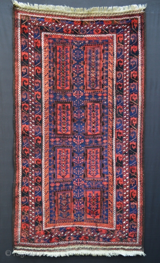 Fabulous indigo-blue, full-pile, glossy wool Timuri rug in excellent condition and complete with brocaded skirts circa 1890-1900. 1.98m x 1.10m (6' 6" x 3' 7").        