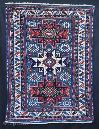 Antique east Caucasian Lesghi rug with aqua-marine field (not blue) in good overall condition 1.42m x 1.04m (4' 8" x 3' 5").           