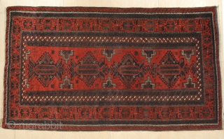 Baluch, ca. 1900-10, 110 x 190 cm. One of the nicest bearing this design. Many types of gazelles in the field. Excellent red background.Deep black-corrosion, otherwise general good condition.    