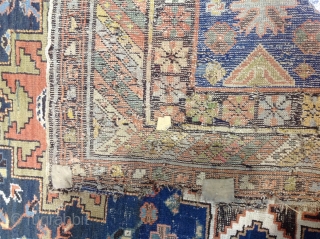 Antique lesghi star design shirvan carpet, 253x166cm, country house find, showing some dye erosion and repairs.                 