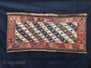 Shahsavan Moghan Sumack mafrash side/long panel. 
Size is cm 45x100 ca. Datable 1880/1890. The Shahsavan loved to use the moharamat/stripes pattern, in different variations. Here, in this panel we have diagonal moharamat  ...