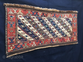 Shahsavan Moghan Sumack mafrash side/long panel. 
Size is cm 45x100 ca. Datable 1880/1890. The Shahsavan loved to use the moharamat/stripes pattern, in different variations. Here, in this panel we have diagonal moharamat  ...