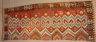 Powerful Western Anatolia Aydinli kilim strip. Cm 100x265 ca. End 19th century. Great ram horn pattern, glorious natural saturated colors. Condition: some minor oxidation, two tiny stains.      