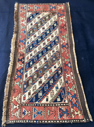 Shahsavan Moghan Sumack mafrash side/long panel. 
Size is cm 45x100 ca. Datable 1880/1890. 
The Shahsavan loved to use the moharamat/stripes pattern, in different variations. Here, in this panel we have diagonal moharamat  ...