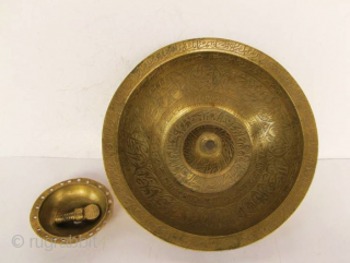"Islamic magic cup"
"RARE ANTIQUE MUSEUM QUALITY BRASS CHIL - KHALID (RITUAL VESSEL) FROM BUKHARA AREA UZBEKHISTAN. THE VESSEL IS COMPLETELY ENGRAVED WITH BEAUTIFUL KUFIC CALLIGRAPHY FROM THE HOLY QURAN." 
This was the  ...