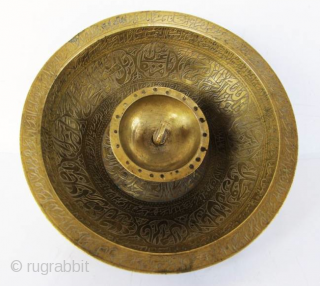"Islamic magic cup"
"RARE ANTIQUE MUSEUM QUALITY BRASS CHIL - KHALID (RITUAL VESSEL) FROM BUKHARA AREA UZBEKHISTAN. THE VESSEL IS COMPLETELY ENGRAVED WITH BEAUTIFUL KUFIC CALLIGRAPHY FROM THE HOLY QURAN." 
This was the  ...